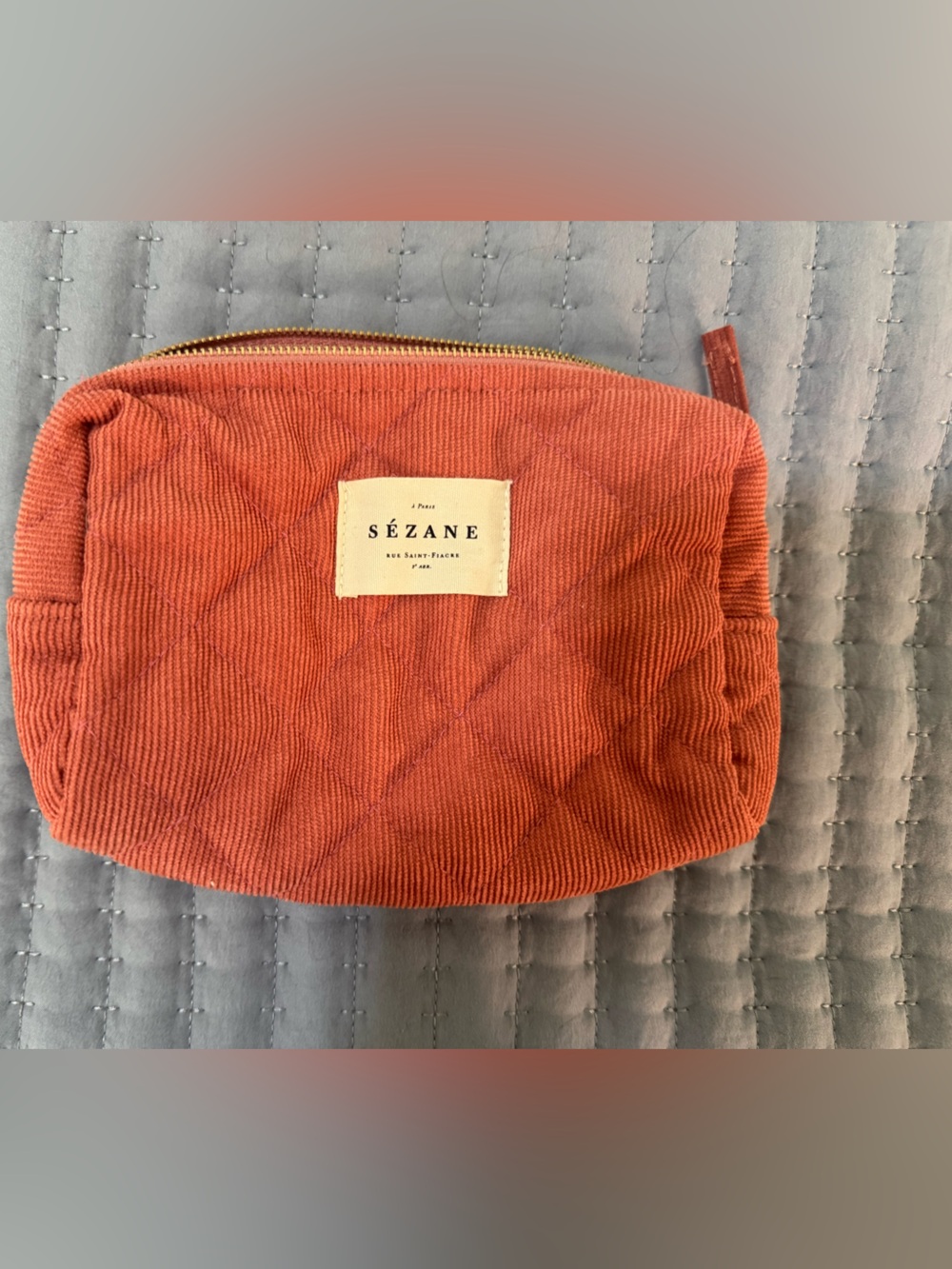 Sézane small coral orange makeup bag